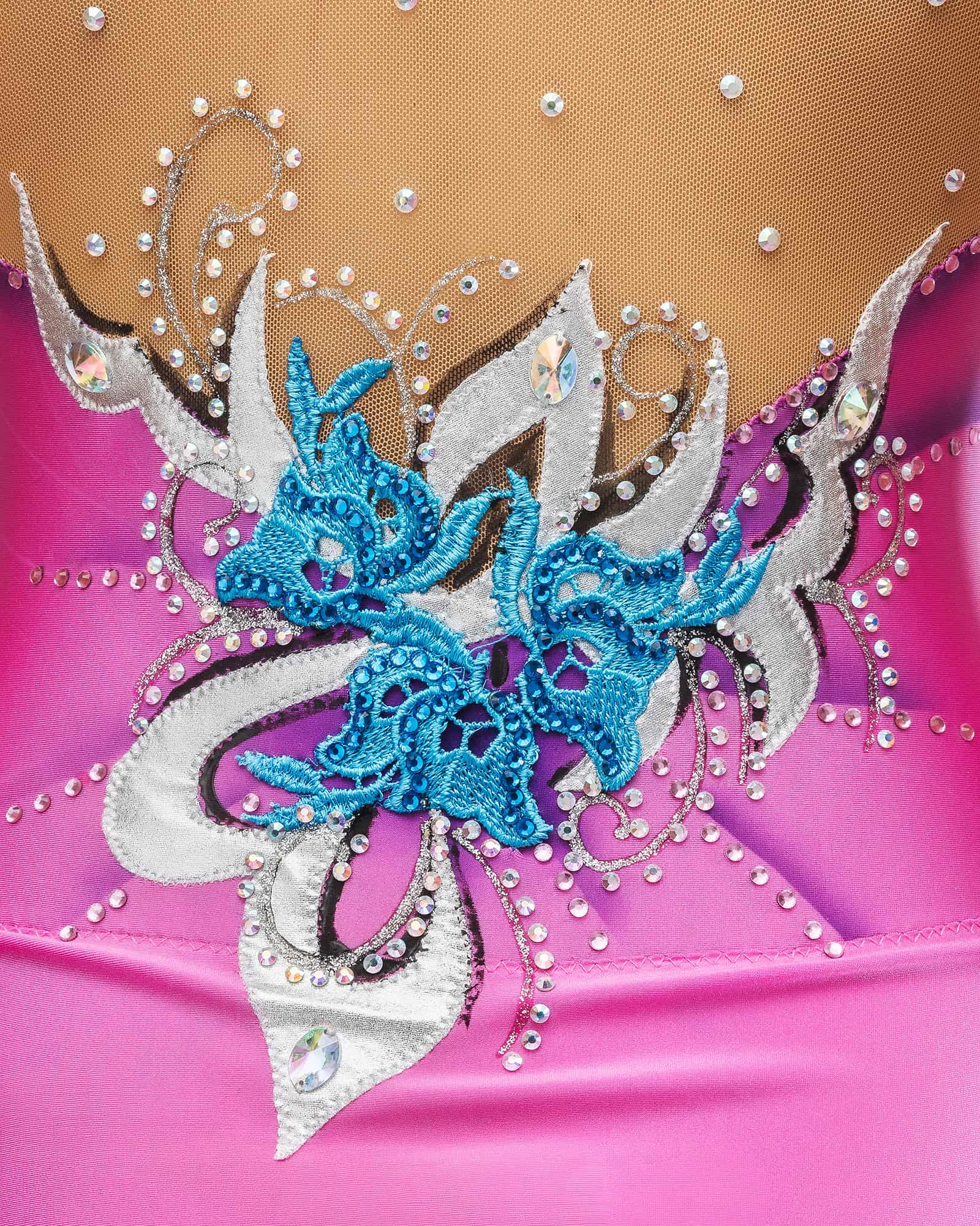 Detail view of professional rhythmic gymnastics competition leotard with open back and floral appliqué
