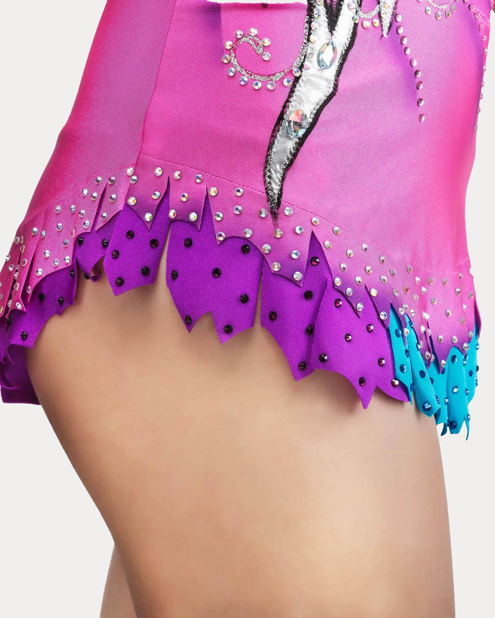 Detail view of professional rhythmic gymnastics competition leotard with open back and floral appliqué